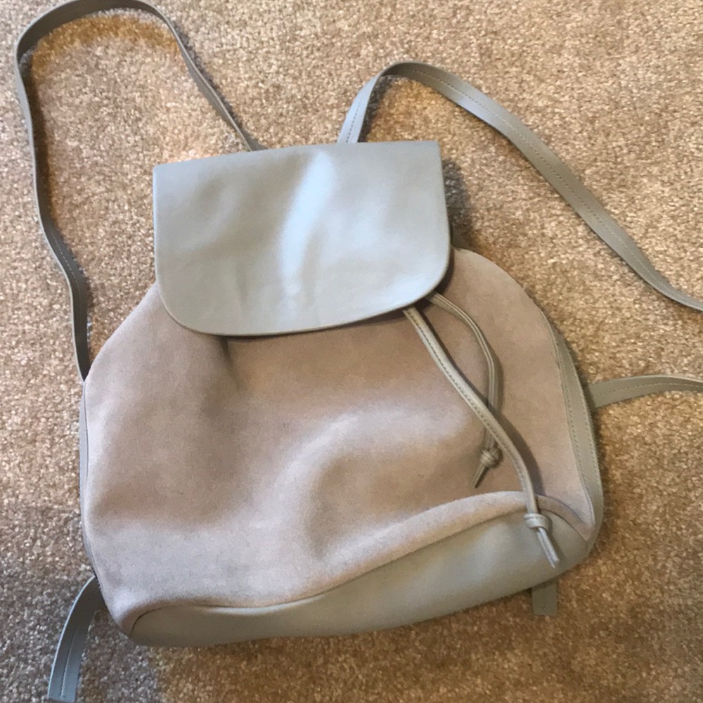 Urban Outfitters silver backpack purse
